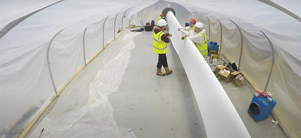 Working on a new textile wind turbine blade. Source: ACT Blade